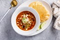 Mexican chicken soup topped with cotija cheese