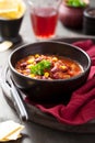 Mexican chili con carne in black bowl Royalty Free Stock Photo