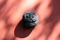 Mexican aztec stone made skull skeleton dias de los muertos day of the death dead