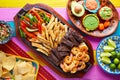 Mexican combo beef chicken fajitas shrimp Royalty Free Stock Photo