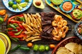 Mexican combo beef chicken fajitas shrimp Royalty Free Stock Photo