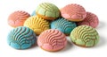 Vibrant Mexican conchas with soft bread texture and sugar shell pattern, isolated on white Royalty Free Stock Photo