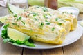 Mexican corn with butter, mayonnaise, parmesan, chili, cilantro, lime Royalty Free Stock Photo