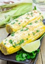 Mexican corn with butter, mayonnaise, parmesan, chili, cilantro, lime Royalty Free Stock Photo