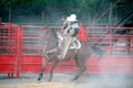 Mexican cowboy practising roping on horseback, TX, US Royalty Free Stock Photo