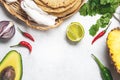 Mexican cuisine food frame - ingredients for mexican tacos al pastor, corn tortillas, chili pepper, pineapple, avocado, cilantro, Royalty Free Stock Photo