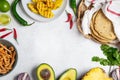 Mexican cuisine food frame - ingredients for mexican tacos al pastor, corn tortillas, chili pepper, pineapple, avocado, cilantro, Royalty Free Stock Photo