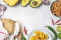 Mexican cuisine food frame - ingredients for mexican tacos al pastor, corn tortillas, chili pepper, pineapple, avocado, cilantro, Royalty Free Stock Photo