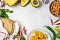 Mexican cuisine food frame - ingredients for mexican tacos al pastor, corn tortillas, chili pepper, pineapple, avocado, cilantro, Royalty Free Stock Photo