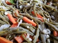 lot of chopped nopal salad with carrot and onion, background and texture