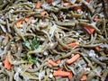 lot of chopped nopal salad with carrot and onion, background and texture