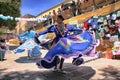 Mexican dancers wearing colourful typical dresses