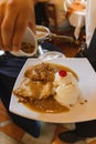 Mexican dessert Cajeta crepes with vanilla ice cream close up caramel sauce Royalty Free Stock Photo