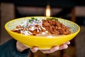 mexican dish with chilaquiles and pork chicharron