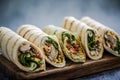 Mexican fajita wraps on serving board, copy space Royalty Free Stock Photo