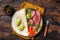 Mexican fajitas for grilled beef steak and vegetables. Wooden background. top view Royalty Free Stock Photo