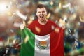 A Mexican fan, a fan of a man holding the national flag of Mexico in his hands. Soccer fan in the stadium. Mixed media Royalty Free Stock Photo