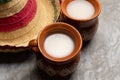 Mexican fermented beverage called pulque on a gray background Royalty Free Stock Photo