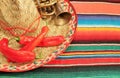 Mexican fiesta poncho background sombrero chilli mariachi stock, photo, photograph, image, picture Royalty Free Stock Photo