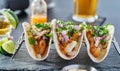 Mexican fish tacos in metal tray