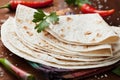 Mexican flatbread tortilla on wooden board