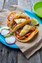 Mexican food: Authentic tacos al pastor with lime and pineapple