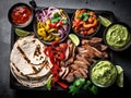 mexican food, beef and chicken fajitas with mexican sauces seen from above, mexican restaurant, typical dish, created with AI Royalty Free Stock Photo