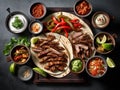 mexican food, beef and chicken fajitas with mexican sauces seen from above, mexican restaurant, typical dish, created with AI Royalty Free Stock Photo