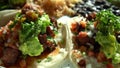 Mexican food Carnitas Taco spicy braised pork with salsa spice and guacamole avocado topping close up tacoes