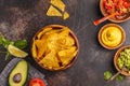 Mexican food concept. Nachos - yellow corn totopos chips with va Royalty Free Stock Photo