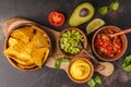 Mexican food concept. Nachos - yellow corn totopos chips with va Royalty Free Stock Photo