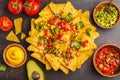 Mexican food concept. Nachos - yellow corn totopos chips with va Royalty Free Stock Photo