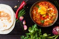 Mexican food - huevos rancheros. Eggs poached in tomato sauce Royalty Free Stock Photo