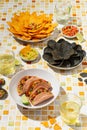 Mexican Food - Latino Party Snacks. Vegetarian tacos with vegetables and beans, nachos with guacamole sauce and spicy