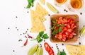 Mexican food salsa, chips and tequila shots with lime Royalty Free Stock Photo