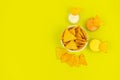 Mexican food. Tortilla chips in a white plate on a colored background Royalty Free Stock Photo