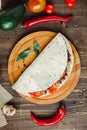 Mexican food - vegetarian quesadilla on wooden board. Royalty Free Stock Photo