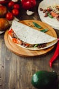 Mexican food - vegetarian quesadilla on wooden board. Royalty Free Stock Photo