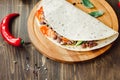 Mexican food - vegetarian quesadilla on wooden board. Royalty Free Stock Photo