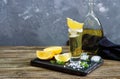 Mexican Gold Tequila in the shot glass with lemon and sea salt on dark table. Royalty Free Stock Photo