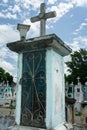 Mexican grave with cross in cemetery