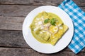 Mexican green enchiladas with melted cheese also called Suizas Royalty Free Stock Photo