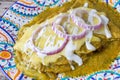 Mexican green enchiladas with melted cheese Royalty Free Stock Photo