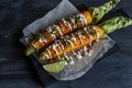 Mexican grilled corn, elote, dark photo Royalty Free Stock Photo