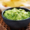 Mexican guacamole in molcajete bowl