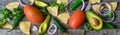 Mexican guacamole sauce ingredients on wooden background Royalty Free Stock Photo