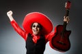 Mexican guitar player in red