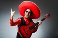 Mexican guitar player in red