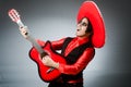 The mexican guitar player in red