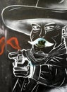 A mexican with a gun, graffiti